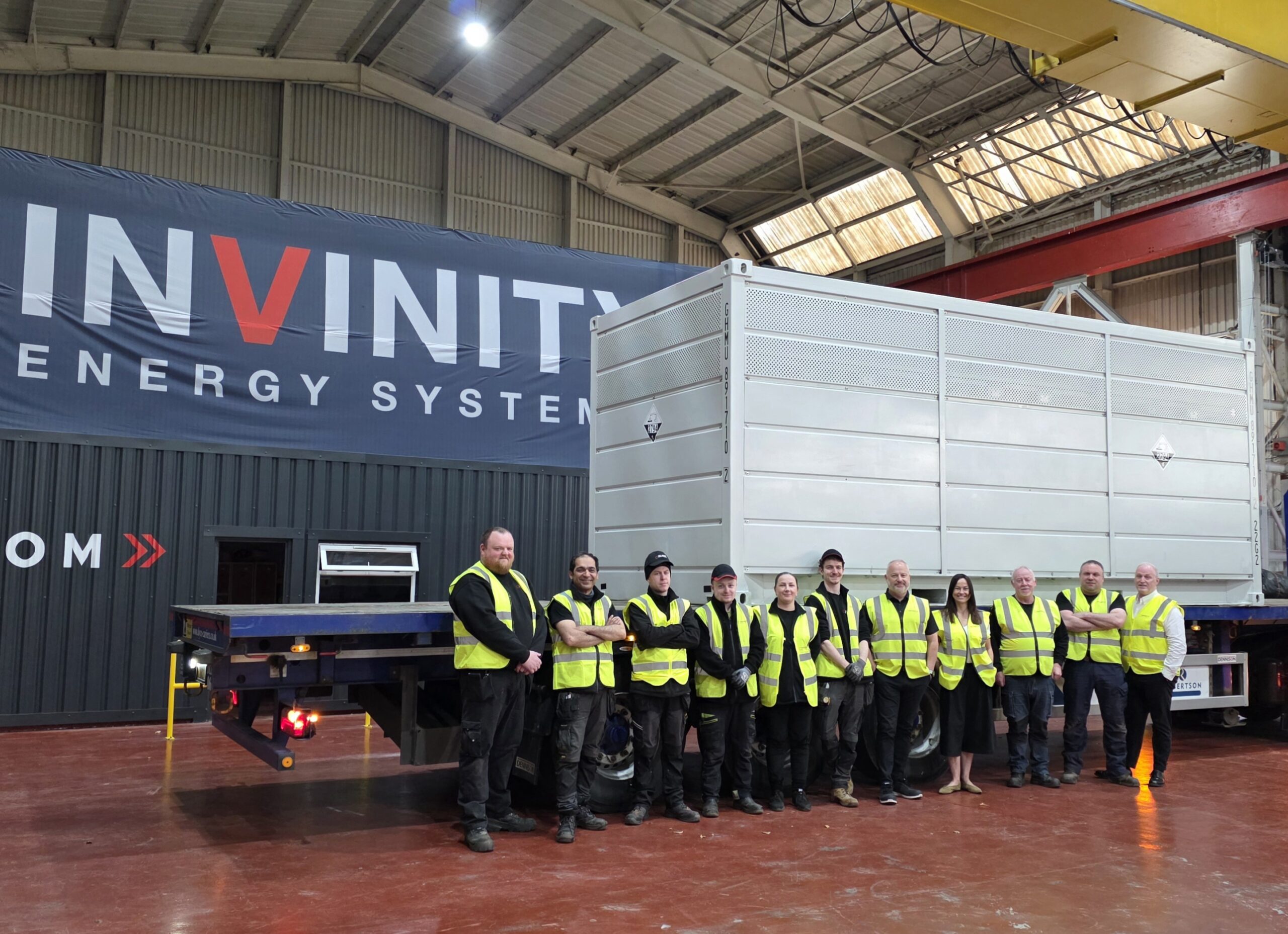 Invinity team members at the loading of the last battery for the Copwood VFB Energy Hub